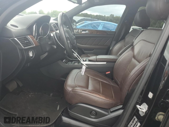 2015 Mercedes-Benz GL with VIN 4JGDF6EE7FA580014, listed as a Copart auction lot 55137704 with 115,624 mi miles and Salvage Title. Bid and sale history available at carsss.com. Image 7.