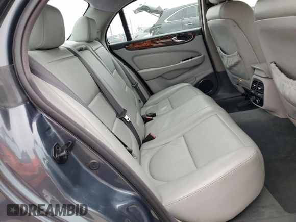 2004 Jaguar XJ with VIN SAJWA71C04SG22878, listed as a Copart auction lot 44383205 with 127,515 mi miles and Clean Title. Bid and sale history available at carsss.com. Image 10.