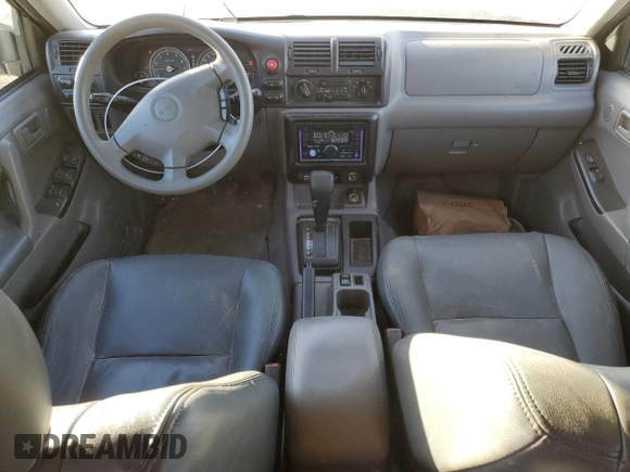 2003 Isuzu Rodeo with VIN 4S2DM58W734305363, listed as a Copart auction lot 85539774 with 219,300 mi miles and Salvage title. Bid and sale history available at DreamBid. Image 8.