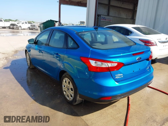 2012 Ford Focus SE with VIN 1FAHP3F24CL415176, listed as a IAAI auction lot 41993864 with 103,805 mi miles. Bid and sale history available at carsss.com. Image 3.