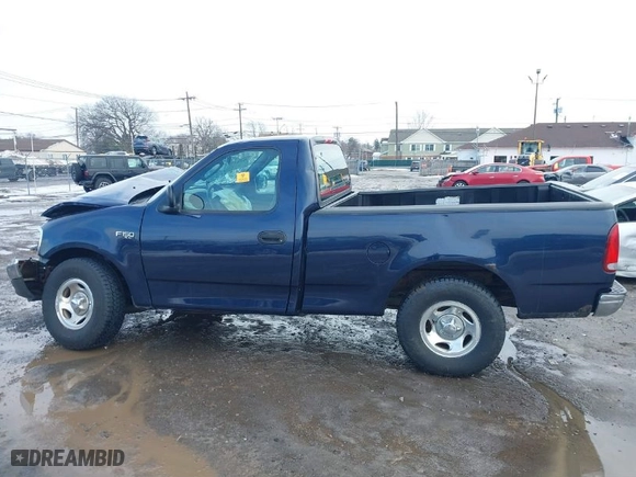 2003 Ford F-150 Heritage XL with VIN 2FTRF172X3CA60139, listed as a IAAI auction lot 41608378 with 81,965 mi miles. Bid and sale history available at carsss.com. Image 14.