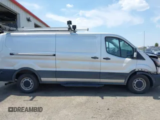 2020 Ford Transit Cargo z VIN 1FTYE1Y80LKB53684, wystawiony jako IAAI lot #42556377 z przebiegiem 102 801 mil mil oraz . Historia ofert i sprzedaży dostępna na DreamBid. Obrazek 14.