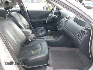 2002 Nissan Altima S with VIN 1N4AL11D62C717139, listed as a IAAI auction lot 41569217 with 135,200 mi miles. Bid and sale history available at carsss.com. Image 5.