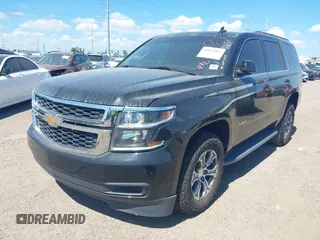 2020 Chevrolet Tahoe LS with VIN 1GNSCAKC4LR293082, listed as a IAAI auction lot 42663985 with 143,114 mi miles and . Bid and sale history available at DreamBid. Image 2.