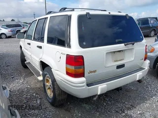 1996 Jeep Grand Cherokee Limited with VIN 1J4GZ78Y1TC381474, listed as a IAAI auction lot 42467661 with 155,587 mi miles and . Bid and sale history available at DreamBid. Image 3.