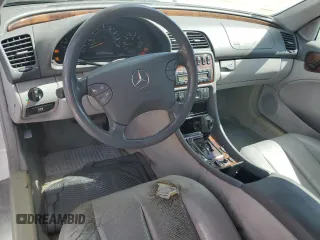 2003 Mercedes-Benz CLK-Class 3.2L with VIN WDBLK65G73T135929, listed as a Copart auction lot 76175704 with 114,677 mi miles and Salvage Title. Bid and sale history available at carsss.com. Image 8.