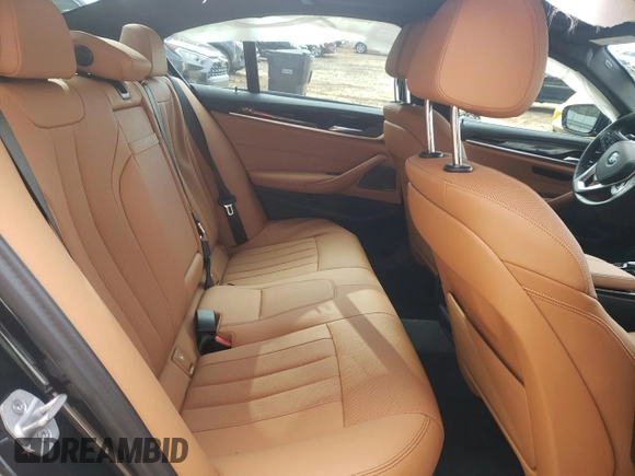 2023 BMW 5 Series 530e with VIN WBA13AG05PCM94563, listed as a Copart auction lot 87515145 with Not provided miles and Salvage title. Bid and sale history available at DreamBid. Image 11.