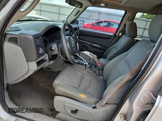 2007 Jeep Commander Sport z VIN 1J8HG48P47C691235, wystawiony jako Copart lot #64057505 z przebiegiem 135 641 mil mil oraz Szkoda całkowita • Salvage title. Historia ofert i sprzedaży dostępna na DreamBid. Obrazek 7.