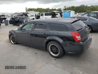 2005 Dodge Magnum SE with VIN 2D4FV48V65H510653, listed as a Copart auction lot 70927144 with 105,350 mi miles and Salvage Title. Bid and sale history available at carsss.com. Image 2.