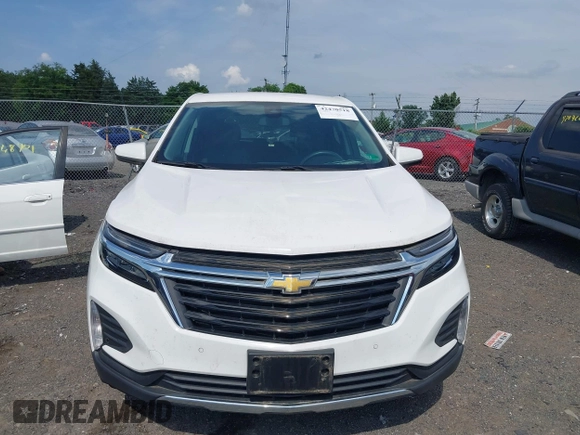 2022 Chevrolet Equinox LT z VIN 3GNAXUEV9NL174839, wystawiony jako IAAI lot #42470518 z przebiegiem 18 709 mil mil oraz . Historia ofert i sprzedaży dostępna na DreamBid. Obrazek 12.