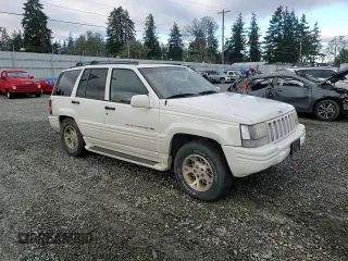 1997 Jeep Grand Cherokee Limited with VIN 1J4GZ78Y7VC772292, listed as a Copart auction lot 87692445 with 0 mi miles and Salvage Title. Bid and sale history available at carsss.com. Image 11.