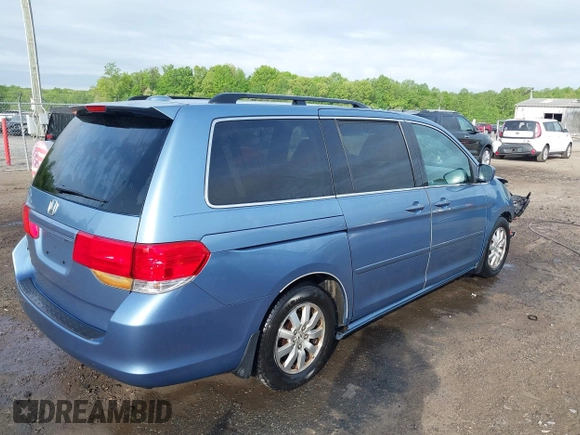 2010 Honda Odyssey EX-L with VIN 5FNRL3H63AB075187, listed as a IAAI auction lot 42114126 with 131,272 mi miles. Bid and sale history available at carsss.com. Image 4.