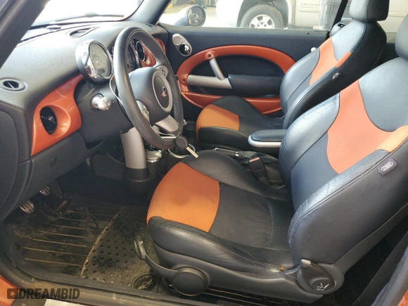 2007 MINI Cooper Convertible S with VIN WMWRH33597TJ43057, listed as a Copart auction lot 69005524 with 93,341 mi miles and Clean Title. Bid and sale history available at carsss.com. Image 7.