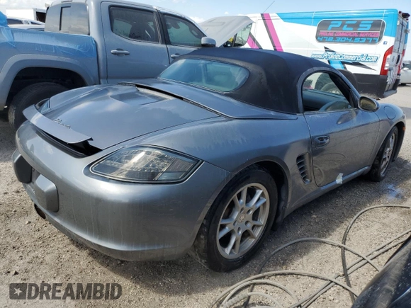 2005 Porsche Boxster с VIN WP0CA29875U711919, выставлен на аукционе Copart как лот 74299934 с пробегом Не указан миль и На запчасти • Non repairable. История ставок и продаж доступна на DreamBid. Изображение 3.