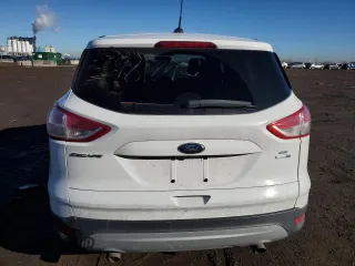 2015 Ford Escape SE with VIN 1FMCU9GX2FUB28617, listed as a Copart auction lot 46711975 with 131,963 mi miles and Salvage Title. Bid and sale history available at DreamBid. Image 6.