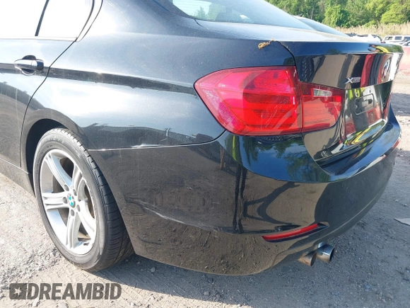 2014 BMW 3 Series 328i xDrive with VIN WBA3B5G56ENS06890, listed as a IAAI auction lot 42168982 with 133,664 mi miles. Bid and sale history available at carsss.com. Image 18.