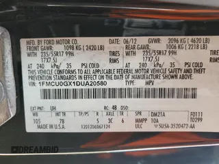 2013 Ford Escape SE z VIN 1FMCU0GX1DUA20580, wystawiony jako Copart lot #52644595 z przebiegiem 151 143 mil mil oraz Szkoda całkowita • Salvage title. Historia ofert i sprzedaży dostępna na DreamBid. Obrazek 15.