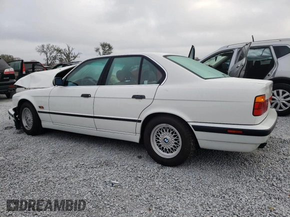 1995 BMW 5 Series 525i z VIN WBAHD6326SGK83552, wystawiony jako Copart lot #45245825 z przebiegiem 181 607 mil mil oraz Szkoda całkowita • Salvage title. Historia ofert i sprzedaży dostępna na DreamBid. Obrazek 2.