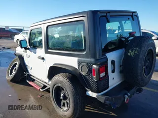 2021 Jeep Wrangler Sport S with VIN 1C4GJXAN2MW663880, listed as a IAAI auction lot 41059915 with 83,867 mi miles and . Bid and sale history available at DreamBid. Image 3.