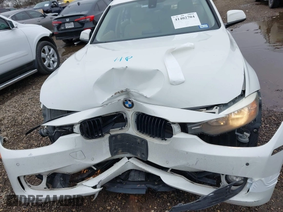 2014 BMW 3 Series 328i xDrive with VIN WBA3B5G50ENS06304, listed as a IAAI auction lot 41402704 with 139,943 mi miles. Bid and sale history available at carsss.com. Image 6.