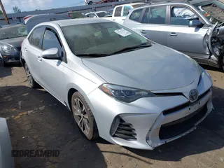 2017 Toyota Corolla L z VIN 2T1BURHE8HC785578, wystawiony jako IAAI lot #41923274 z przebiegiem 794 000 mil mil oraz . Historia ofert i sprzedaży dostępna na DreamBid. Obrazek 1.