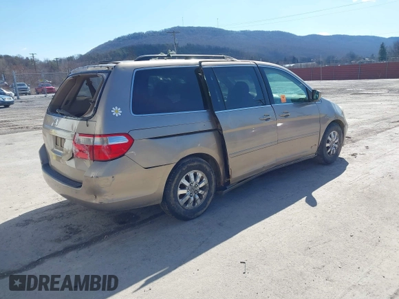 2006 Honda Odyssey EX z VIN 5FNRL384X6B459148, wystawiony jako IAAI lot #41747616 z przebiegiem 158 995 mil mil oraz . Historia ofert i sprzedaży dostępna na DreamBid. Obrazek 4.