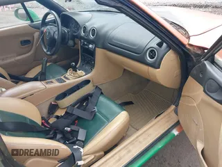 1999 Mazda MX-5 Miata with VIN JM1NB3531X0116676, listed as a IAAI auction lot 42454285 with 201,534 mi miles and . Bid and sale history available at DreamBid. Image 5.