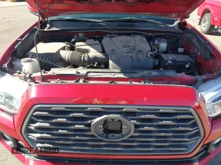 2021 Toyota Tacoma 4WD SR5 with VIN 3TMDZ5BN3MM102098, listed as a IAAI auction lot 41381650 with 30,642 mi miles. Bid and sale history available at carsss.com. Image 10.