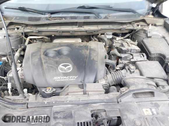 2015 Mazda CX-5 Touring with VIN JM3KE2CY2F0461935, listed as a IAAI auction lot 41430070 with 220,857 mi miles and . Bid and sale history available at DreamBid. Image 10.