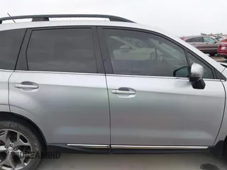 2015 Subaru Forester Touring with VIN JF2SJAUC8FH467730, listed as a IAAI auction lot 42403195 with 142,287 mi miles and . Bid and sale history available at DreamBid. Image 13.