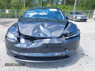 2025 Tesla Model 3 Long Range with VIN 5YJ3E1EA9SF897555, listed as a IAAI auction lot 41886716 with 6,757 mi miles and . Bid and sale history available at carsss.com. Image 13.