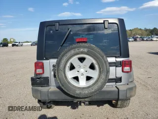 2013 Jeep Wrangler Unlimited Sport z VIN 1C4BJWDG7DL597491, wystawiony jako Copart lot #50719435 z przebiegiem Nie podano mil oraz Szkoda całkowita • Salvage title. Historia ofert i sprzedaży dostępna na DreamBid. Obrazek 6.
