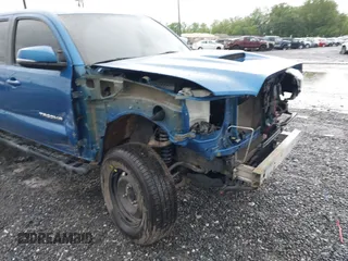 2017 Toyota Tacoma SR5 z VIN 3TMCZ5AN3HM059269, wystawiony jako IAAI lot #42231882 z przebiegiem 127 092 mil mil oraz . Historia ofert i sprzedaży dostępna na DreamBid. Obrazek 6.