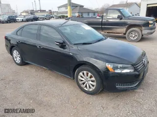 2015 Volkswagen Passat 1.8T Wolfsburg Ed with VIN 1VWAT7A34FC006773, listed as a IAAI auction lot 42027520 with 99,579 mi miles. Bid and sale history available at carsss.com. Image 1.