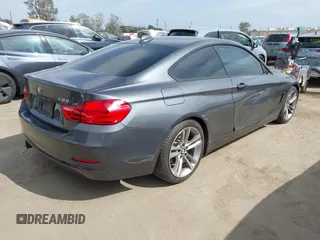 2014 BMW 4 Series 428i with VIN WBA3N7C5XEF718428, listed as a IAAI auction lot 42043910 with 157,686 mi miles and . Bid and sale history available at DreamBid. Image 4.