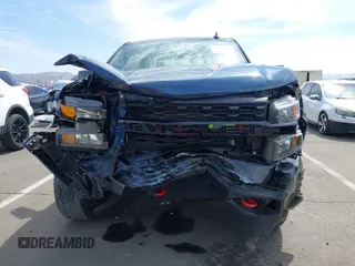 2021 Chevrolet Silverado 1500 Custom Trail Boss with VIN 3GCPYCEF0MG137222, listed as a IAAI auction lot 41906200 with 29,517 mi miles and . Bid and sale history available at DreamBid. Image 12.