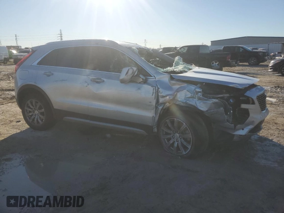 2020 Cadillac XT4 FWD Premium Luxury with VIN 1GYFZCR44LF099246, listed as a Copart auction lot 41861735 with 98,018 mi miles and Salvage title. Bid and sale history available at DreamBid. Image 4.