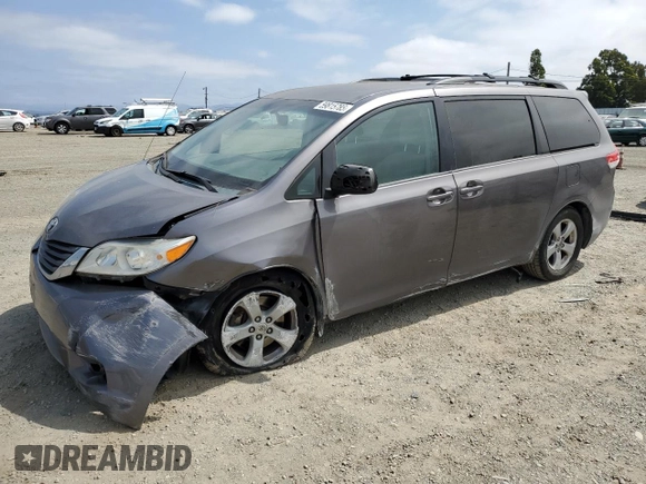 2014 Toyota Sienna LE AAS with VIN 5TDKK3DC6ES491574, listed as a Copart auction lot 59815785 with 189,975 mi miles and Salvage title. Bid and sale history available at DreamBid. Image 1.