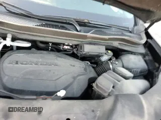 2021 Honda Pilot Elite с VIN 5FNYF6H09MB020943, выставлен на аукционе Copart как лот 81868105 с пробегом 73 095 миль миль и На запчасти • Non repairable. История ставок и продаж доступна на DreamBid. Изображение 14.