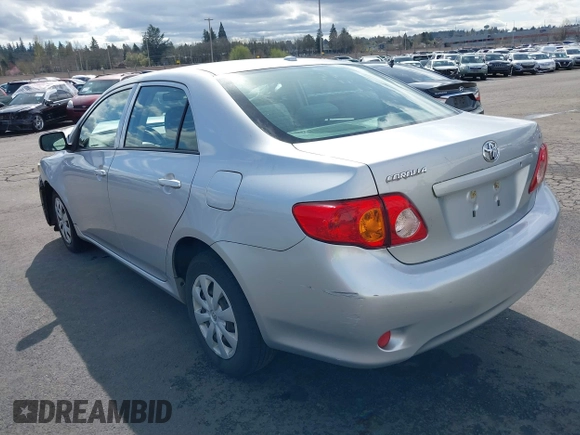 2009 Toyota Corolla with VIN JTDBL40E59J051651, listed as a IAAI auction lot 41874710 with 52,938 mi miles. Bid and sale history available at carsss.com. Image 3.
