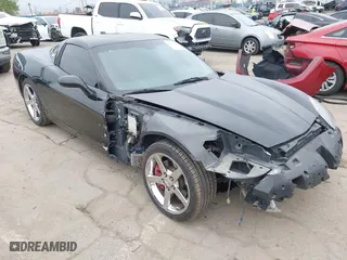 2005 Chevrolet Corvette with VIN 1G1YY24U155119523, listed as a IAAI auction lot 41870761 with 103,986 mi miles. Bid and sale history available at carsss.com. Image 1.