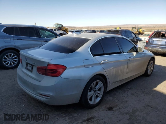 2016 BMW 3 Series with VIN WBA8F1C57GK438945, listed as a Copart auction lot 49090955 with 176,869 mi miles and Salvage title. Bid and sale history available at DreamBid. Image 3.