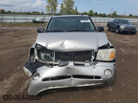 2007 GMC Envoy SLT with VIN 1GKDT13S272265100, listed as a Copart auction lot 73136264 with 245,198 mi miles and Salvage Title. Bid and sale history available at carsss.com. Image 5.