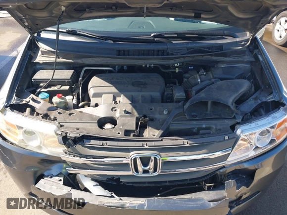 2012 Honda Odyssey EX-L with VIN 5FNRL5H64CB044075, listed as a IAAI auction lot 42094680 with 67,165 mi miles and . Bid and sale history available at carsss.com. Image 10.