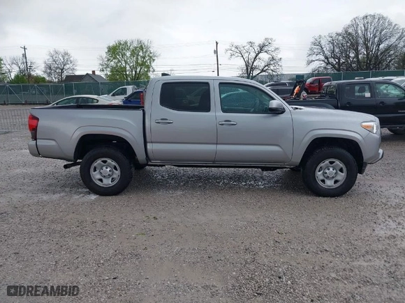 2020 Toyota Tacoma 4WD SR5 with VIN 3TMCZ5AN2LM300117, listed as a IAAI auction lot 41874864 with 59,594 mi miles. Bid and sale history available at carsss.com. Image 13.