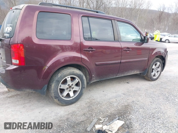 2012 Honda Pilot EX-L with VIN 5FNYF4H51CB045141, listed as a IAAI auction lot 41689396 with 219,792 mi miles and . Bid and sale history available at DreamBid. Image 4.