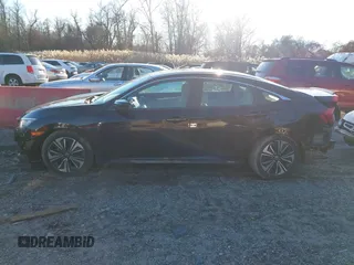 2017 Honda Civic Sedan EX-T with VIN 19XFC1E35HE030656, listed as a IAAI auction lot 38313363 with 128,344 mi miles. Bid and sale history available at carsss.com. Image 15.