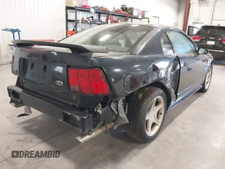 2002 Ford Mustang GT Deluxe with VIN 1FAFP42X32F241774, listed as a IAAI auction lot 41822360 with 130,101 mi miles. Bid and sale history available at carsss.com. Image 4.