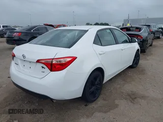 2019 Toyota Corolla L with VIN 5YFBURHE1KP930676, listed as a IAAI auction lot 41940047 with 82,885 mi miles. Bid and sale history available at carsss.com. Image 4.