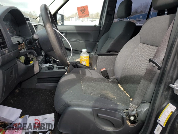 2011 Jeep Liberty Sport with VIN 1J4PN2GK1BW565094, listed as a Copart auction lot 52361215 with 154,027 mi miles and Salvage Title. Bid and sale history available at carsss.com. Image 7.